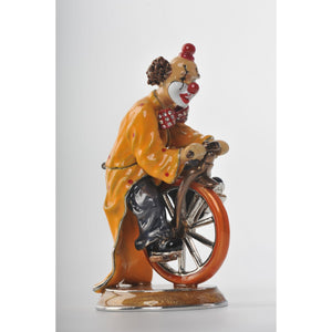 Circus Clown riding the bike by Keren Kopal