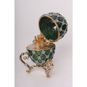 Green Faberge Egg with Gold Carriage Inside by Keren Kopal
