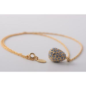 Gold with blue crystals  Faberge Egg Pendant Necklace